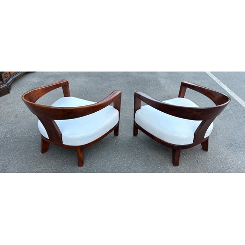 483 - IN THE MANNER OF DAVID LINLEY: TWO DEEP SEATED MID CENTURY ARMCHAIRS WITH WHITE UPHOLSTERED SEATS (2... 