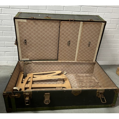 516 - A GENTLEMAN'S TRAVEL WARDROBE TRUNK WITH FITTED INTERIOR