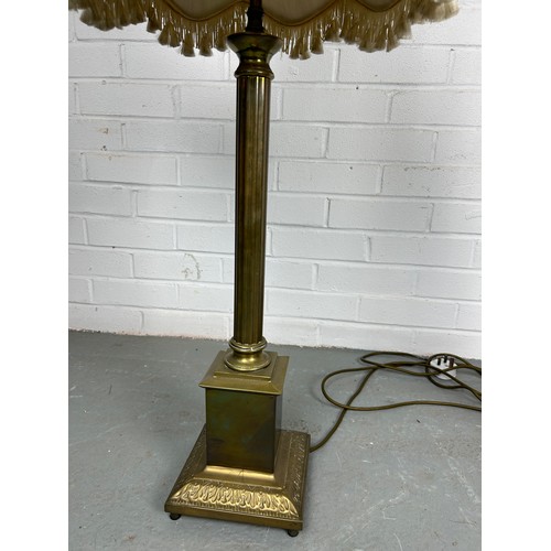 541A - A LARGE CORINTHIUM COLUMN BRASS STANDARD LAMP, ALONG WITH A SIMILAR TABLE LAMP (2)