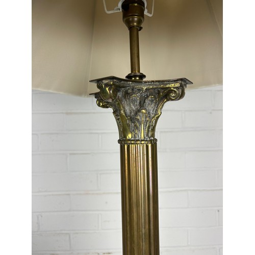 541A - A LARGE CORINTHIUM COLUMN BRASS STANDARD LAMP, ALONG WITH A SIMILAR TABLE LAMP (2)