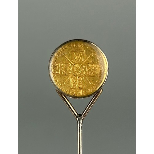 75 - A GEORGE I GOLD QUARTER GUINEA 1718, 

Mounted on a gold pin between glass.

Weight: 5.2gms