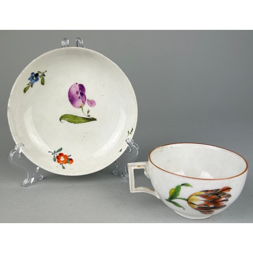 169 - AN 18TH OR 19TH CENTURY MEISSEN TEA CUP AND SAUCER, 

Likely not matching.