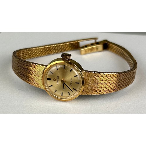 69 - AN OMEGA GENEVE 14CT GOLD LADIES WRISTWATCH

Weight: 24.7gms