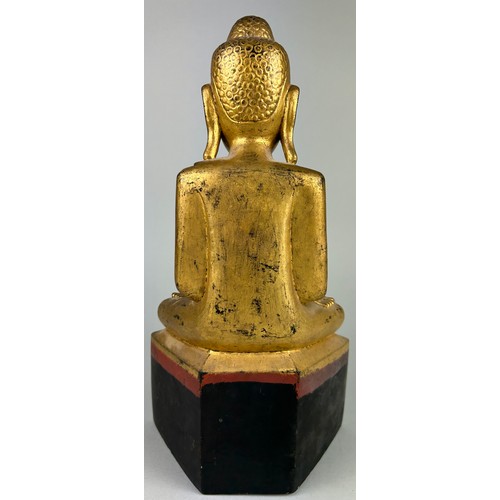 119 - A BURMESE SEATED FIGURE OF THE BUDDHA, 

With certificate supporting to date the piece to 17th/18th ... 