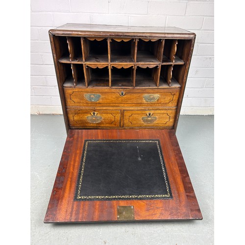 287 - A 19TH CENTURY CAMPAIGN OAK TABLETOP WRITING CABINET,

60cm x 60cm x 33cm 

The fall front opening t... 