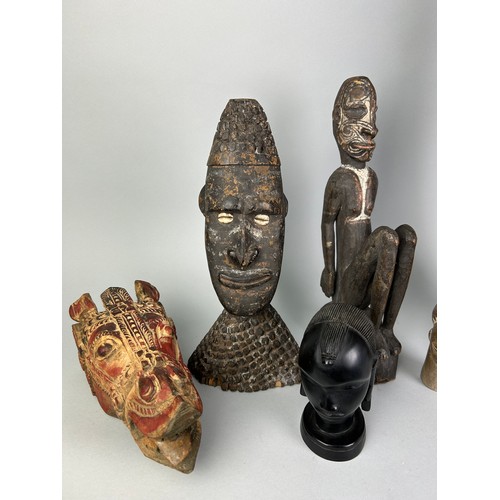 187 - A COLLECTION OF DECORATIVE AFRICAN HEADS AND ORNAMENTS