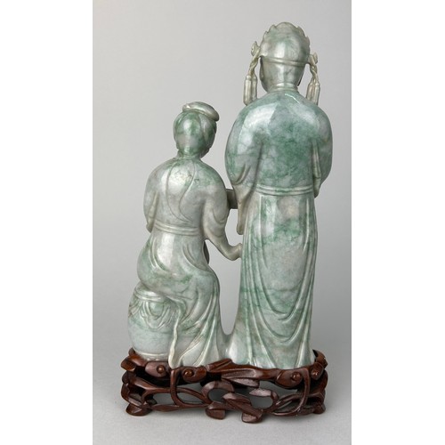 116 - A FINE PAIR OF JADEITE MALE AND FEMALE FIGURES 19TH CENTURY, 

The figures 20cm x 11cm. 

Mounted on... 