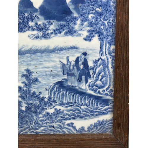 145 - A CHINESE 19TH CENTURY  BLUE AND WHITE PAINTED PORCELAIN PANEL DEPICTING FU LU SHOU BESIDE A RIVER W... 