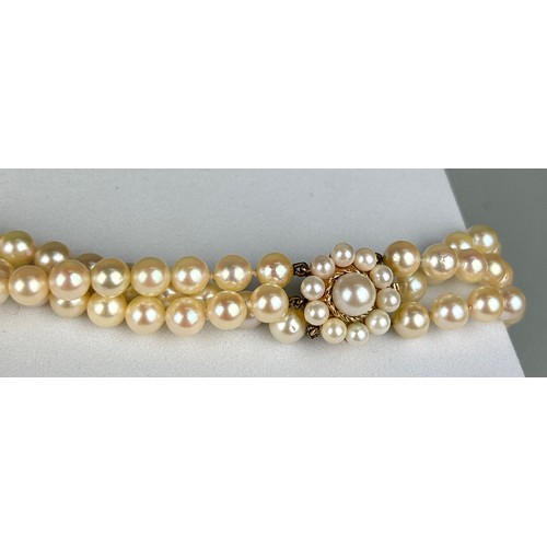 98 - A 9CT GOLD AND CULTURED PEARL triple string necklace