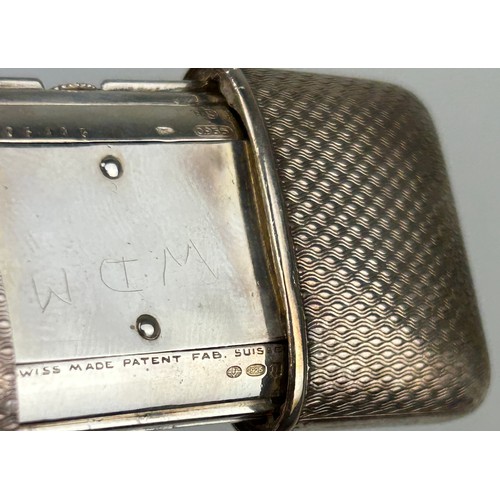 63 - A SILVER MOVADO CHRONOMETER ERMETO SWISS MADE PURSE WATCH,

Marked 925 and housed inside a Mappin an... 