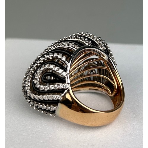 78 - AN 18CT GOLD DECO DESIGN RING SET WITH DIAMONDS AND BLACK ENAMEL, 20.8 grams

Ring size 12.