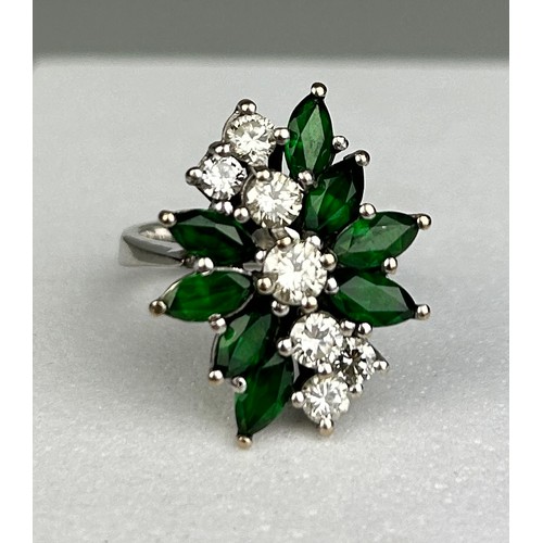 84 - AN 18CT WHITE GOLD RING SET WITH DIAMONDS AND EMERALDS,

7.48gms

Ring size 10.