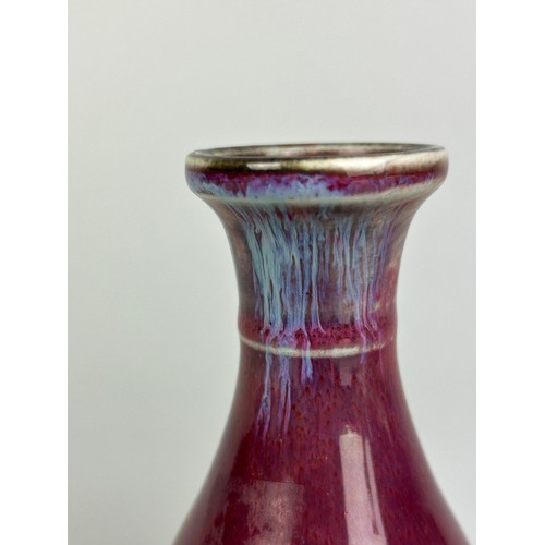 129 - A CHINESE FLAMBE GLAZE VASE POSSIBLY 19TH CENTURY,

13cm H x 6.5cm W