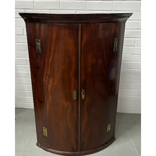 484 - A 19TH CENTURY MAHOGANY CORNER CABINET,