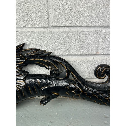 152 - A CHINESE WALL HANGING BLACK PAINTED METAL DRAGON,

90cm x 17cm