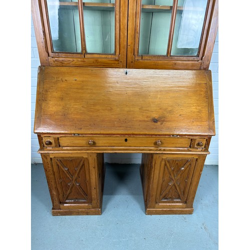 504 - A CONTINENTAL PINE 19TH CENTURY GOTHIC DESIGN BUREAU BOOKCASE OR SECRETAIRE, 

215cm H x 105cm W x 5... 