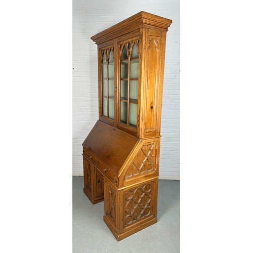 504 - A CONTINENTAL PINE 19TH CENTURY GOTHIC DESIGN BUREAU BOOKCASE OR SECRETAIRE, 

215cm H x 105cm W x 5... 