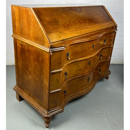 506 - A CONTINENTAL WALNUT SERPENTINE BUREAU, 

116cm x 108cm x 58cm 
Early 20th century, with fall front ... 