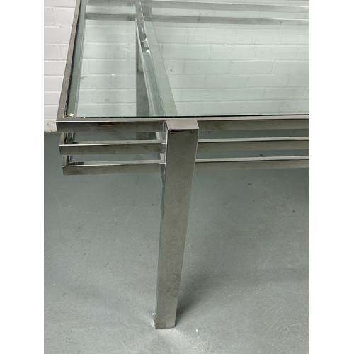 527 - AN ANDREW MARTIN CHROME AND GLASS DINING TABLE,

159cm x 89cm x 74cm