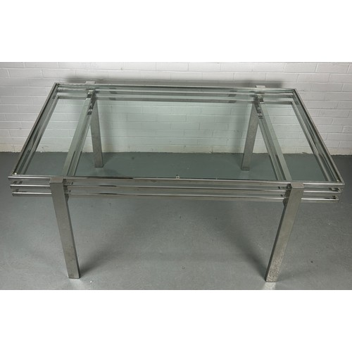 527 - AN ANDREW MARTIN CHROME AND GLASS DINING TABLE,

159cm x 89cm x 74cm