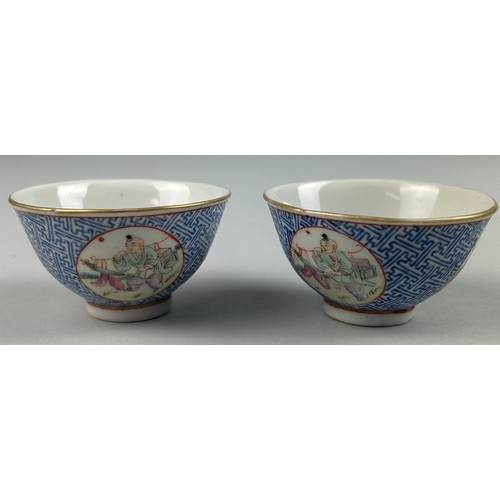 80 - A PAIR OF CHINESE PORCELAIN BLUE WINE CUPS (2)

Each with circular painted panels depicting figures ... 