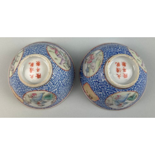 80 - A PAIR OF CHINESE PORCELAIN BLUE WINE CUPS (2)

Each with circular painted panels depicting figures ... 