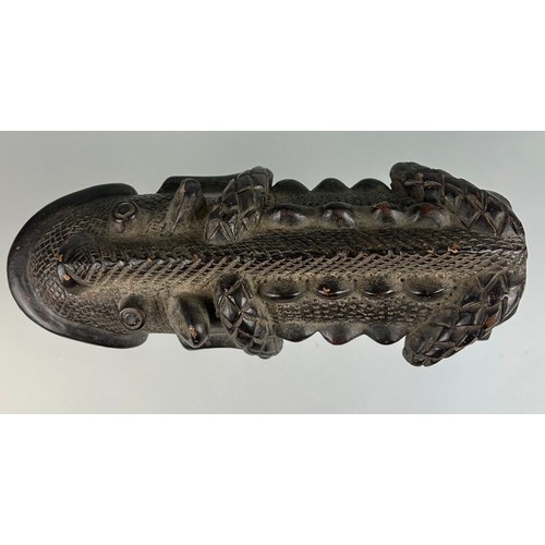 127A - AN AFRICAN TRIBAL CLAY PHALLIC FIGURE ON STAND,

26cm x 12cm 

On stand 22cm H