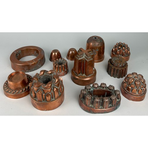 352 - A LARGE COLLECTION OF VICTORIAN JELLY MOULDS OF VARIOUS SHAPES AND SIZES (12) 

One marked 'Register... 