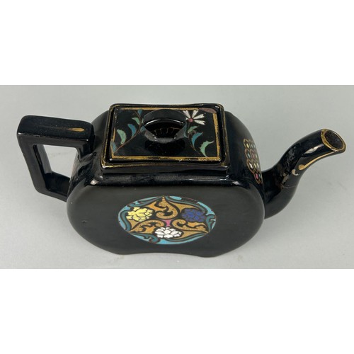 322 - A BLACK VICTORIAN TEA POT PAINTED IN THE CHINESE STYLE