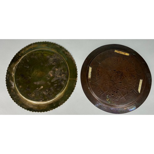 374 - TWO BRASS ISLAMIC PLATES (2) 

Largest 30cm D