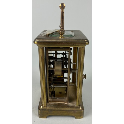 344 - A FRENCH BRASS CARRIAGE CLOCK,

10cm x 6cm 
One glass side missing.