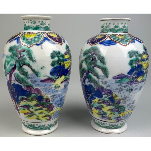 79 - A PAIR OF CHINESE VASES DECORATED WITH FIGURES AND LANDSCAPE SCENES, 

18cm x 9cm each.