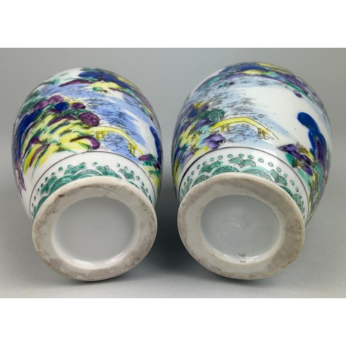 79 - A PAIR OF CHINESE VASES DECORATED WITH FIGURES AND LANDSCAPE SCENES, 

18cm x 9cm each.