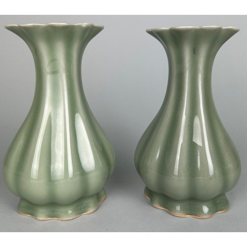 48 - A PAIR OF CELADON YUHUCHUN SHAPED VASES, 

20th Century. 

15cm H each.