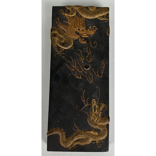 86 - A CHINESE SCHOLARS STONE DECORATED WITH A GOLDEN FIVE CLAWED DRAGON CHASING THE FLAMING PEARL, 

In ... 