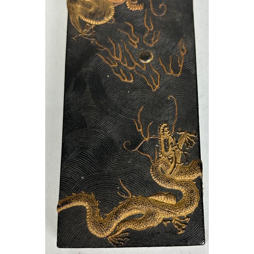 86 - A CHINESE SCHOLARS STONE DECORATED WITH A GOLDEN FIVE CLAWED DRAGON CHASING THE FLAMING PEARL, 

In ... 