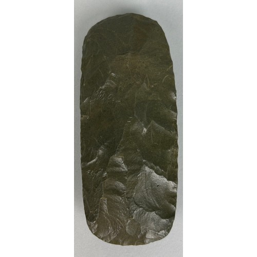 239 - A NEOLITHIC GREEN JASPER FLAKED ADZE FROM THE AIR MOUNTAINS, NIGER,

12cm x 5cm