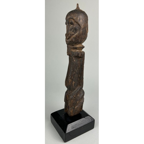 122 - A DOGON STANDING FIGURE MOUNTED ON STAND

30cm x 5cm 

Mounted on a wooden stand.