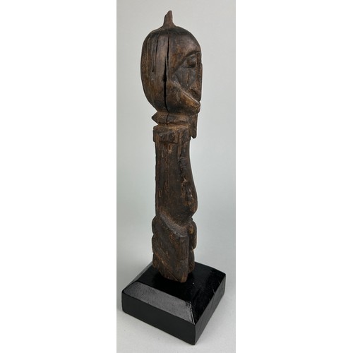 122 - A DOGON STANDING FIGURE MOUNTED ON STAND

30cm x 5cm 

Mounted on a wooden stand.