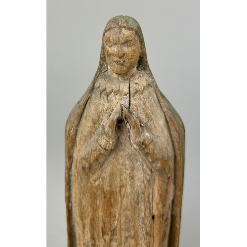 128 - A RELIGIOUS WOODEN CARVING OF THE VIRGIN MARY, 

16cm x 6cm

Mounted on a later wooden stand.