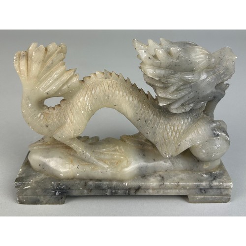 383 - A CHINESE HARDSTONE FIGURE OF A DRAGON, 

13cm x 10cm