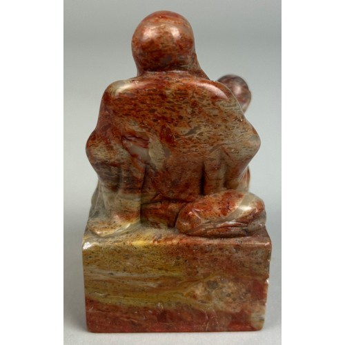 87 - A CHINESE SOAPSTONE FIGURE OF A SEATED BUDDHA, 

9cm x 5cm