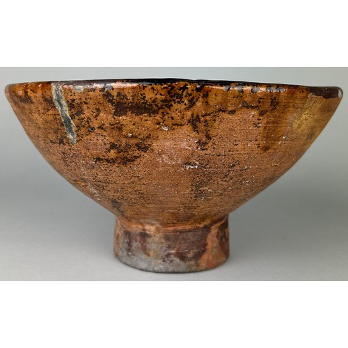 45 - A 14TH CENTURY MAMLUK SLIPWARE POTTERY FOOTED BOWL, 

24cm x 13cm 

Provenance: Purchased by the cur... 