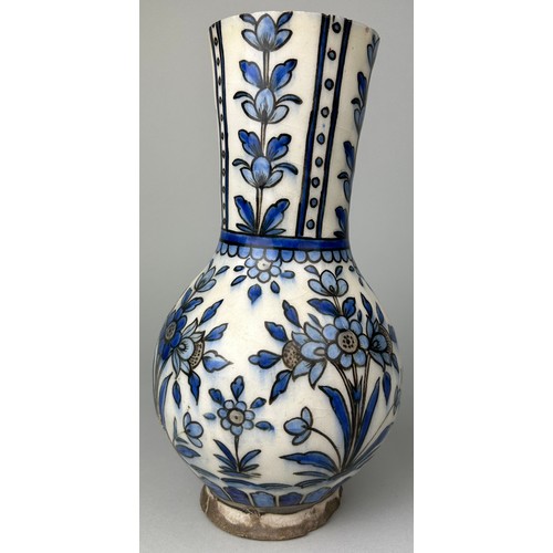 129 - AN IZNIK DESIGN VASE POSSIBLY EARLY 19TH CENTURY DECORATED WITH FLOWERS, 

28cm x 14cm