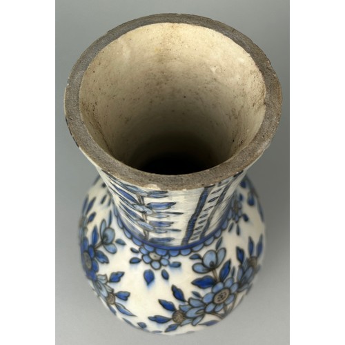 129 - AN IZNIK DESIGN VASE POSSIBLY EARLY 19TH CENTURY DECORATED WITH FLOWERS, 

28cm x 14cm