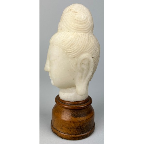 85 - A CHINESE MARBLE HEAD OF A GUANYIN ON STAND,

11cm x 7cm