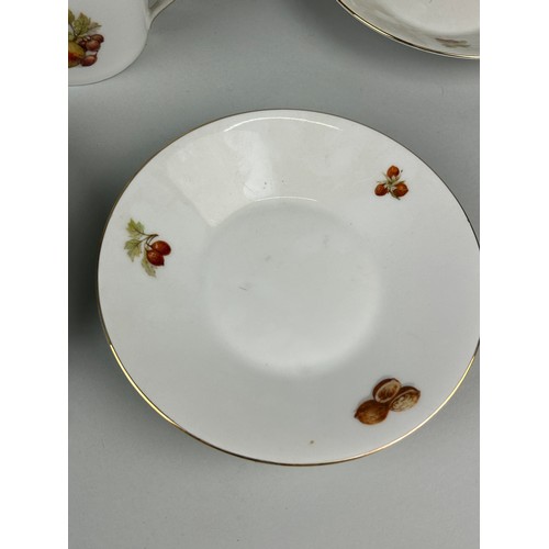 368 - FIVE LARGE FRUIT AND NUT DECORATED CUPS WITH SAUCERS (10)