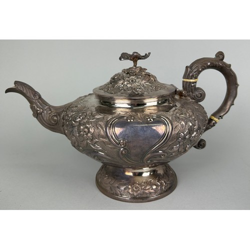 133 - A LARGE SILVER TEA SET MARKED OF IW POSSIBLY JOHN WALTON CIRCA 1830'S, 

Chased and repousse design ... 