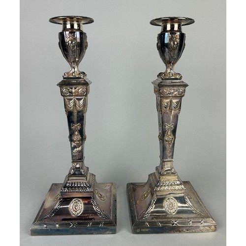 140 - A PAIR OF SILVER COLUMN CANDLESTICKS MARKED FOR HAWKSWORTH, EYRE AND CO LTD, (2) 

Total weight 2852... 