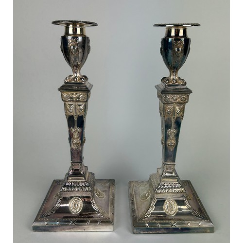 140 - A PAIR OF SILVER COLUMN CANDLESTICKS MARKED FOR HAWKSWORTH, EYRE AND CO LTD, (2) 

Total weight 2852... 